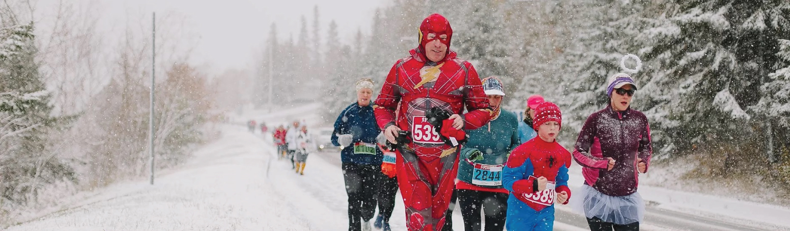 Photo of Haunted Hustle Participants running while dressed in Costumes