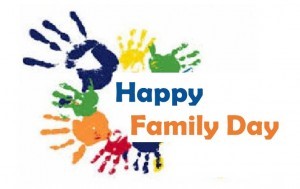Coloured hand prints around Happy Family Day