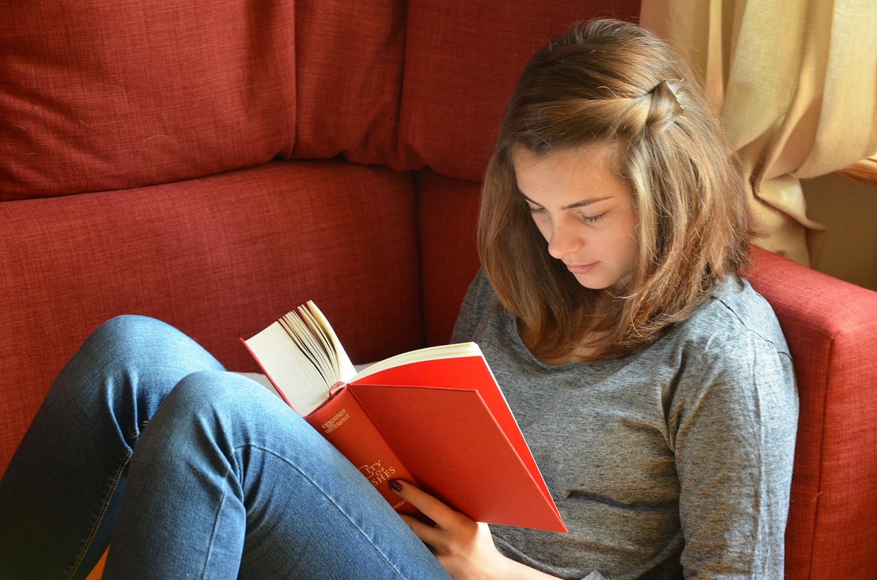 Woman reading on a sofa