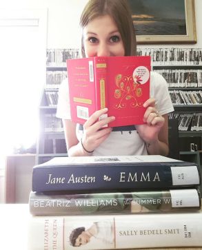 Library clerk Hannah with some books