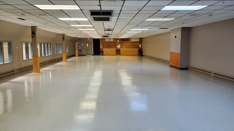 Haileybury Arena hall empty interior photo.